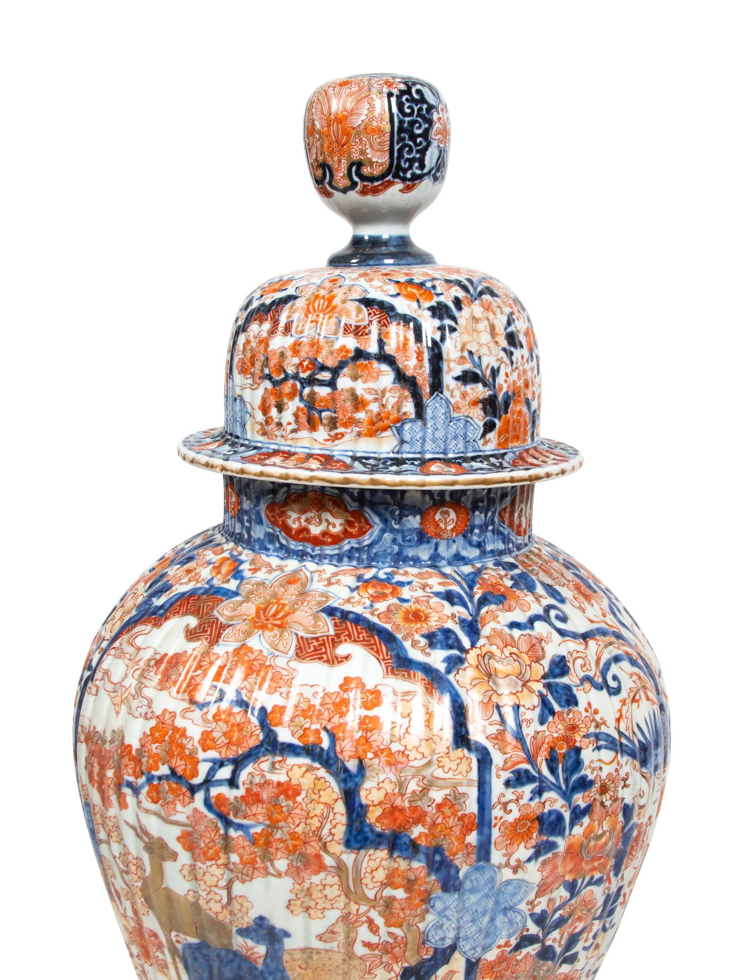 A Pair of Large Japanese Imari Porcelain Covered Jars
