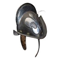 A German Black and White Comb Morian Helmet with Ear Flaps