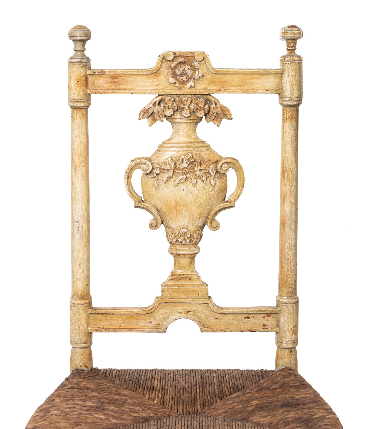 A Set of Seven French Provincial Painted Chairs