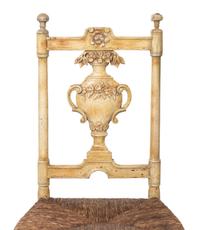 A Set of Seven French Provincial Painted Chairs