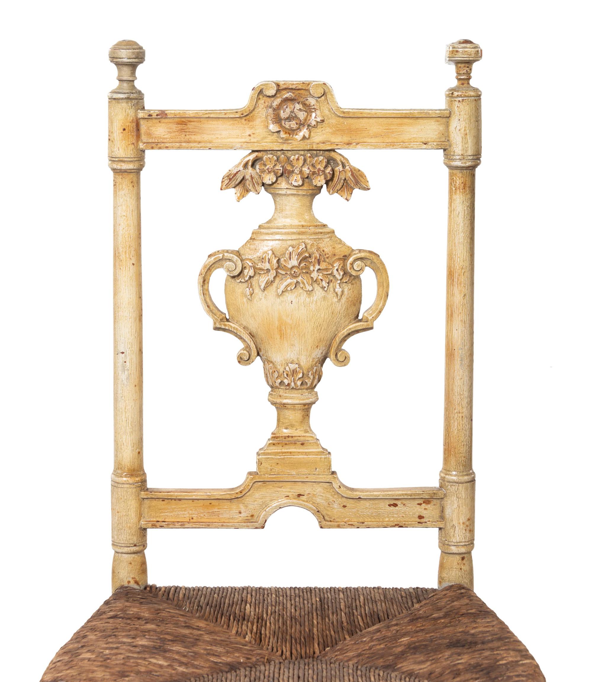 A Set of Seven French Provincial Painted Chairs