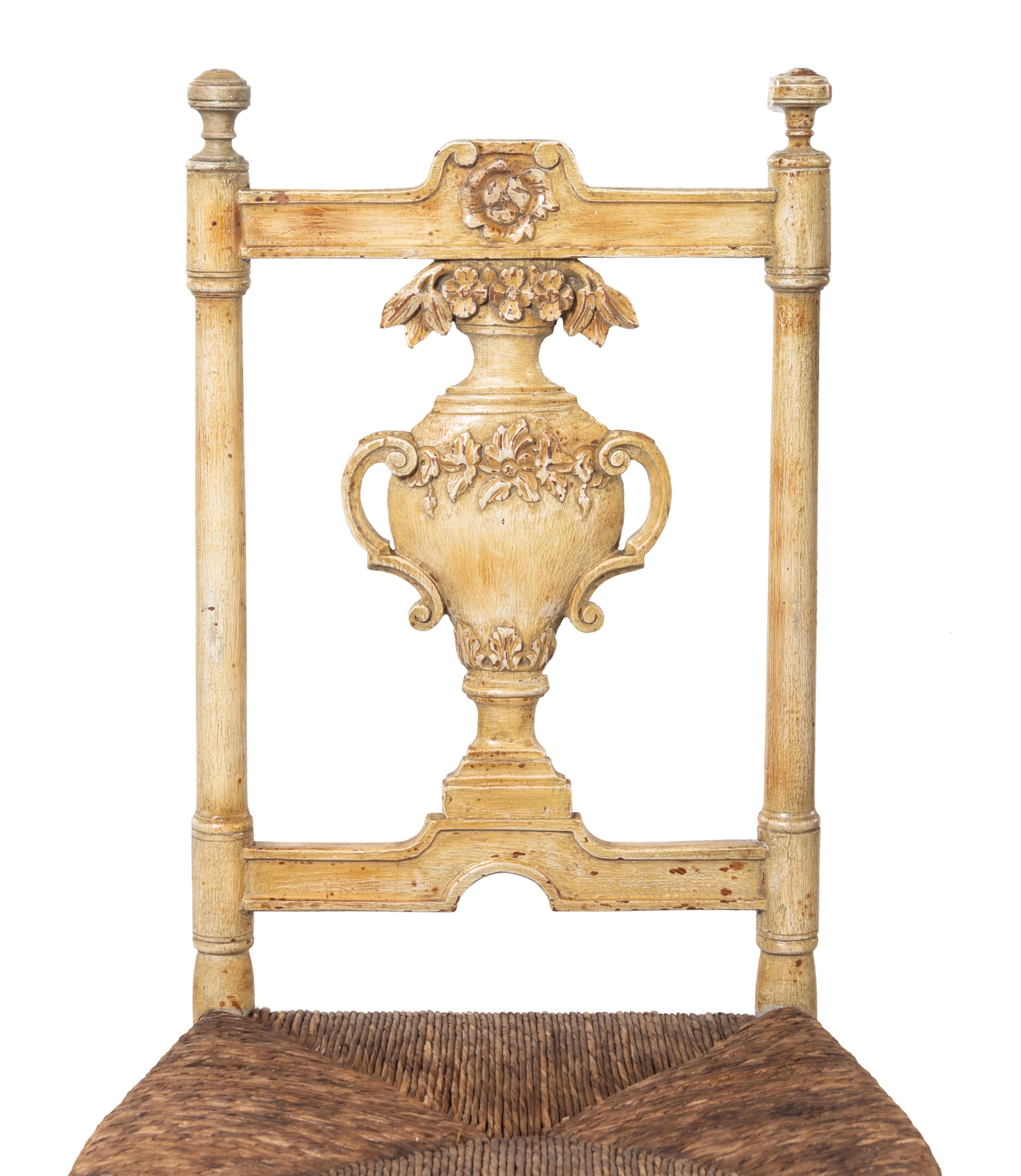A Set of Seven French Provincial Painted Chairs