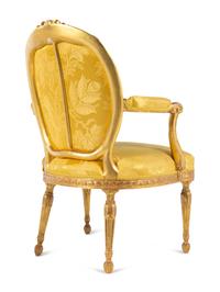 A Pair of George III Carved Giltwood Armchairs