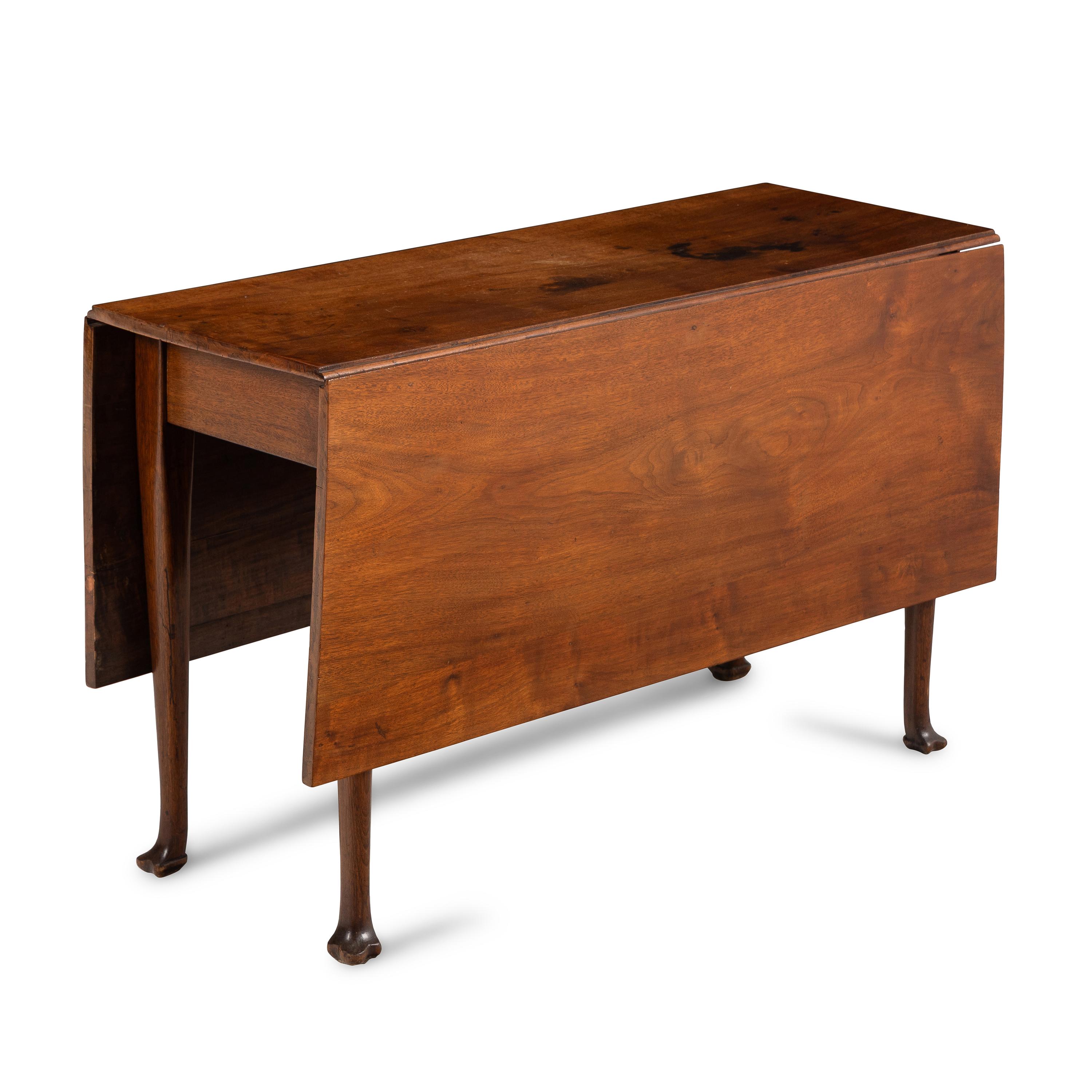 A Queen Anne Style Walnut Drop-Leaf Table