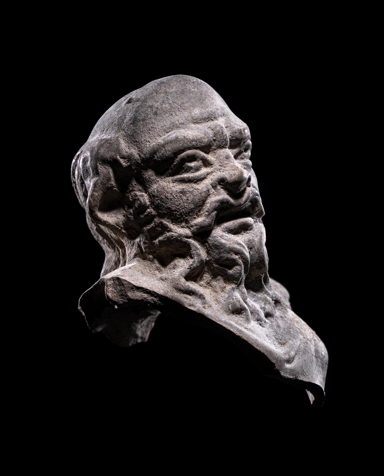 A Hellenistic Terracotta Head of a Satyr