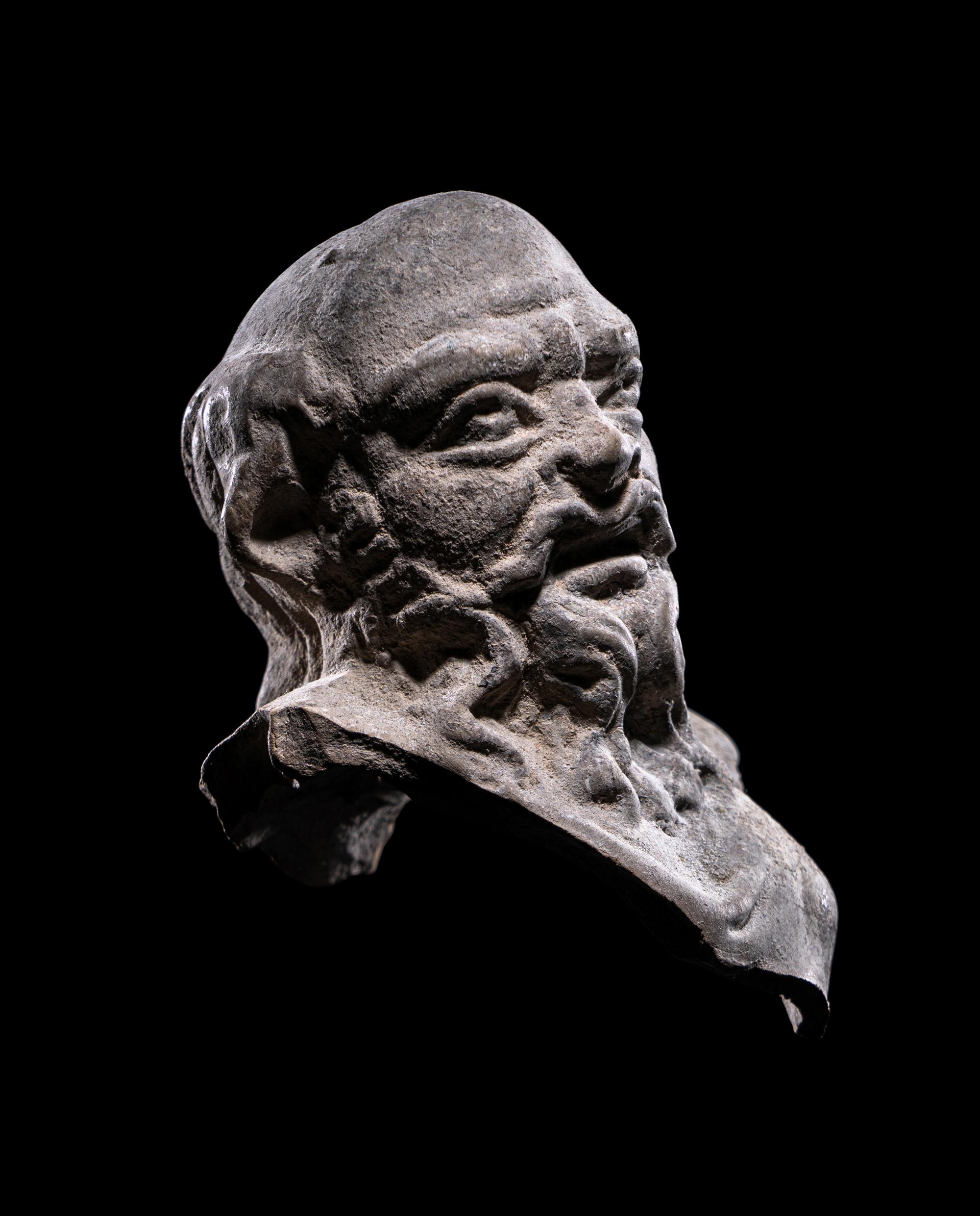A Hellenistic Terracotta Head of a Satyr