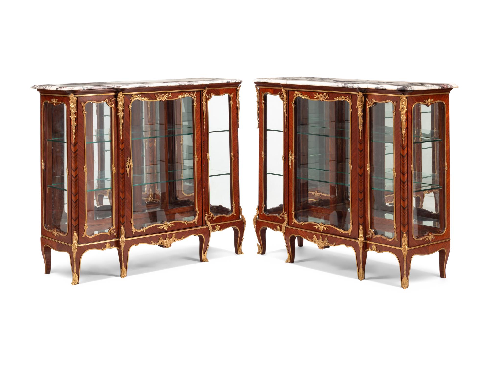 A Pair of Louis XV Style Gilt Bronze Mounted Kingwood Marble-Top Vitrine Cabinets