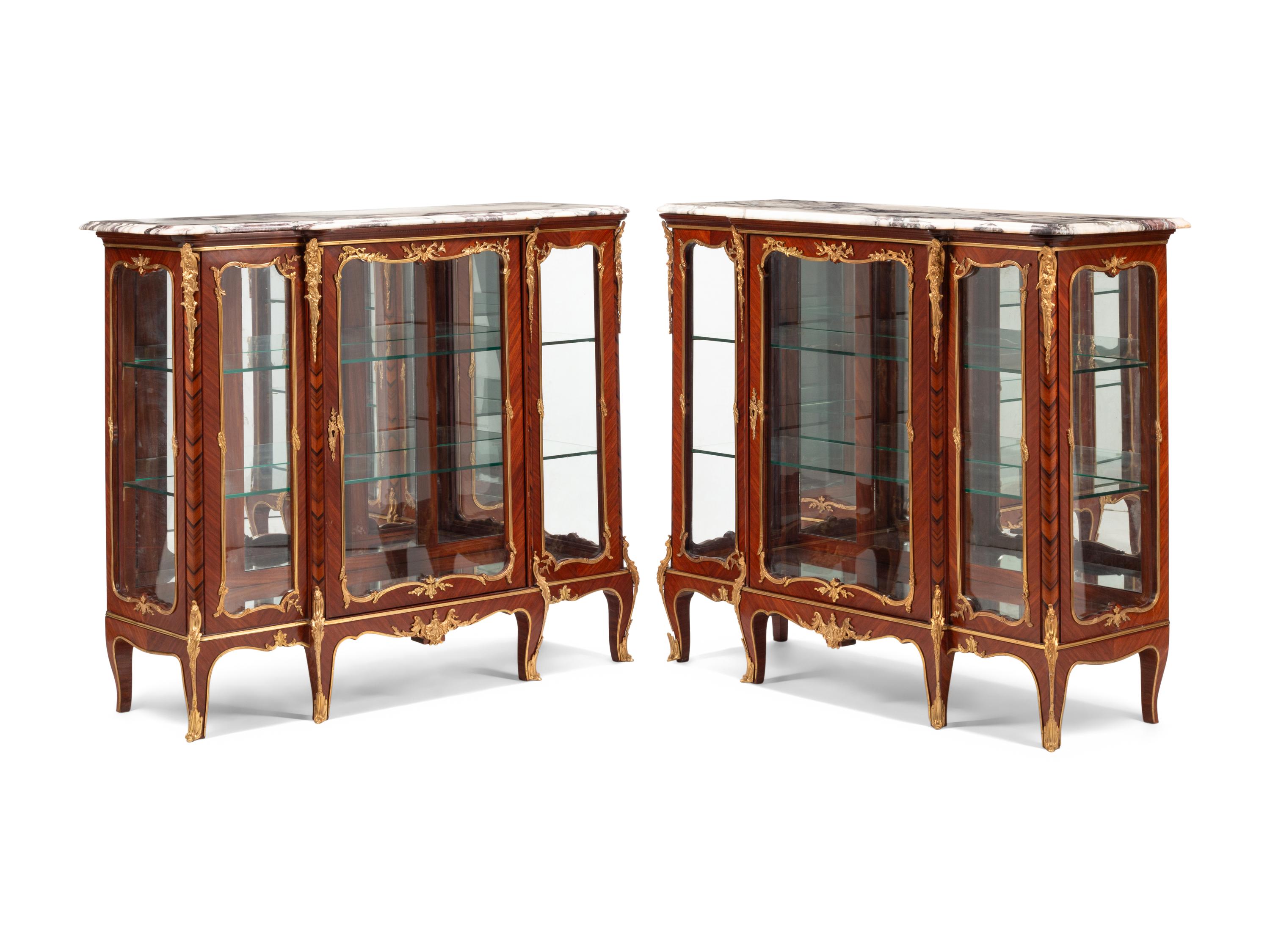 A Pair of Louis XV Style Gilt Bronze Mounted Kingwood Marble-Top Vitrine Cabinets