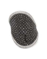 An 18 Karat White Gold, Black Diamond and Diamond Ring,