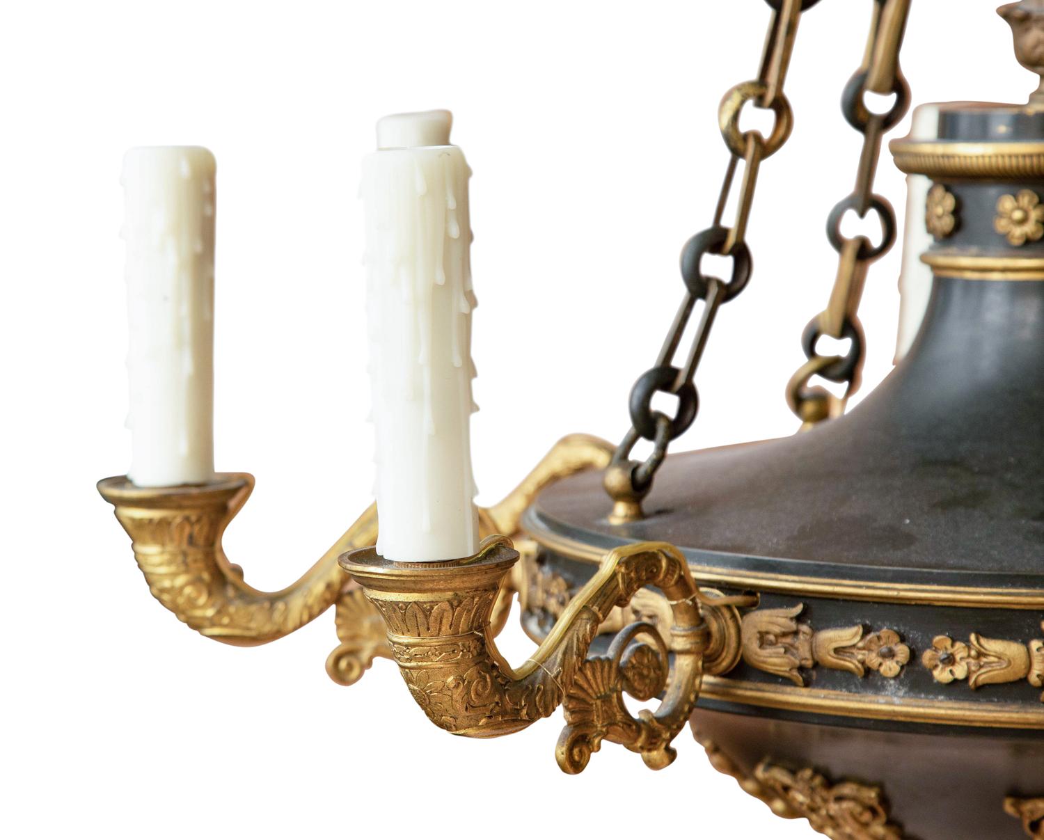 An Empire Style Patinated and Gilt Bronze Eight-Light Chandelier