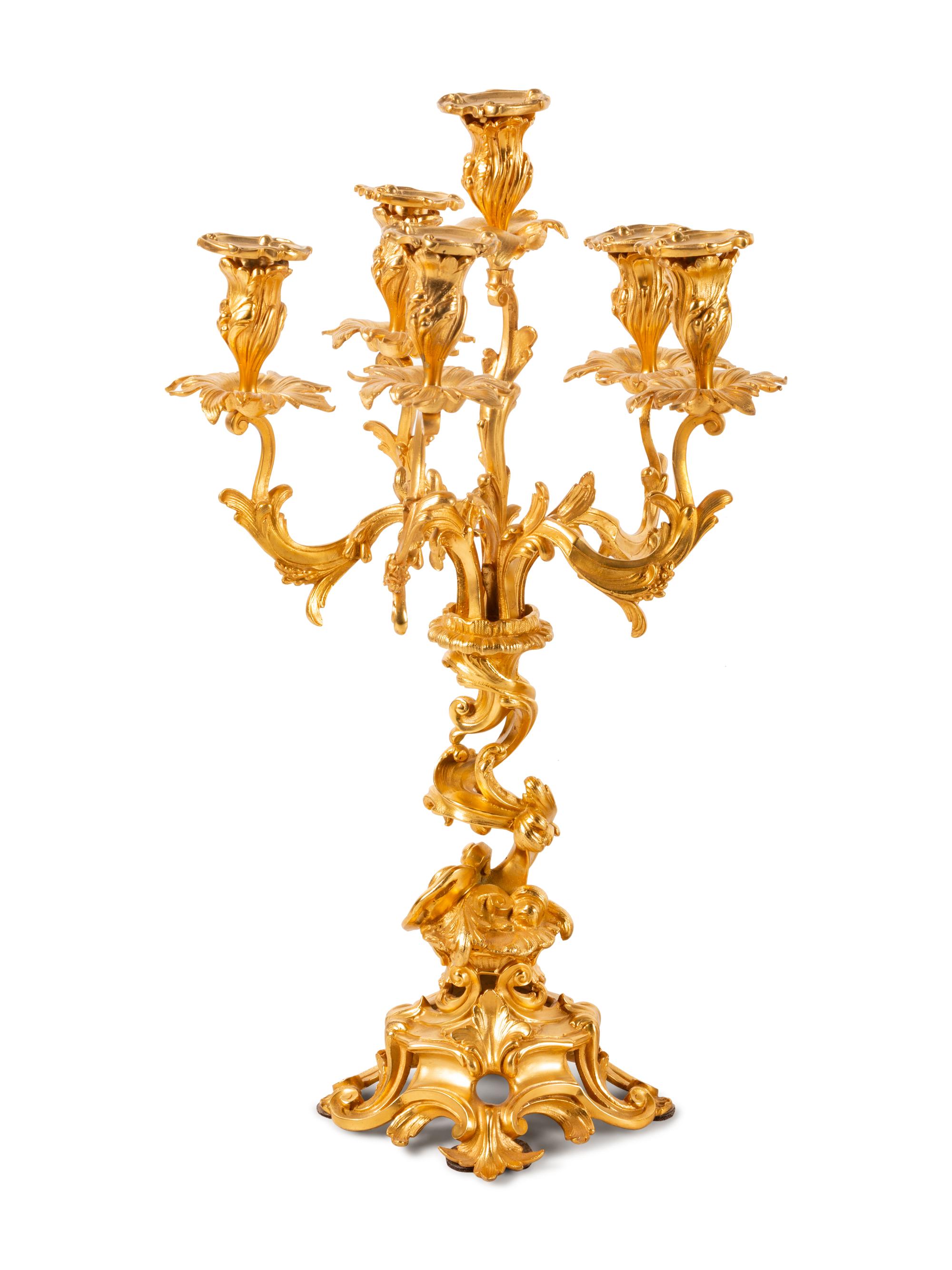 A Louis XV Style Gilt Bronze Clock Garniture