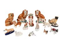 A Group of Staffordshire Porcelain and Pottery Models of Dogs
