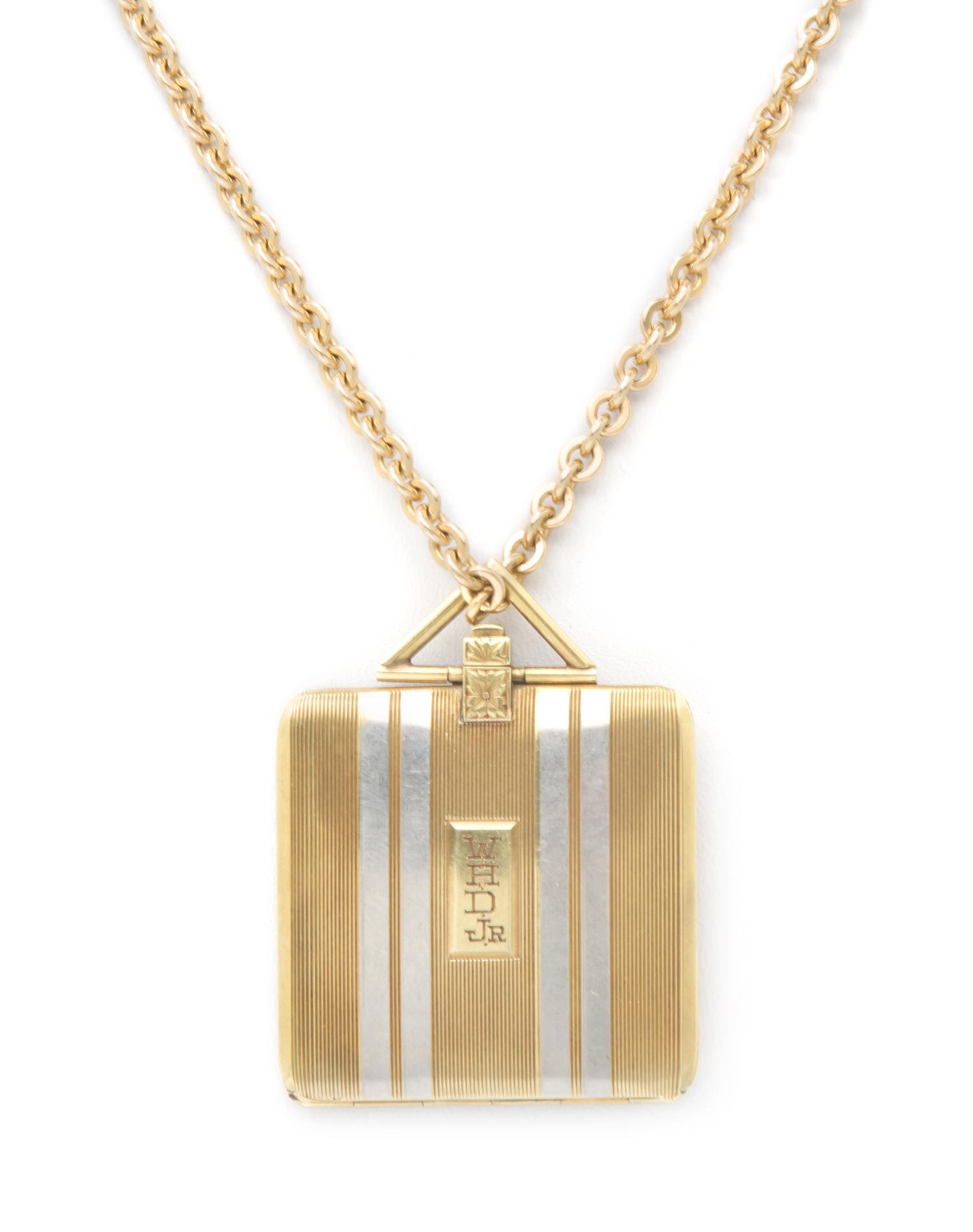 An Art Deco Yellow Gold and Platinum Locket, 34.50 dwts.