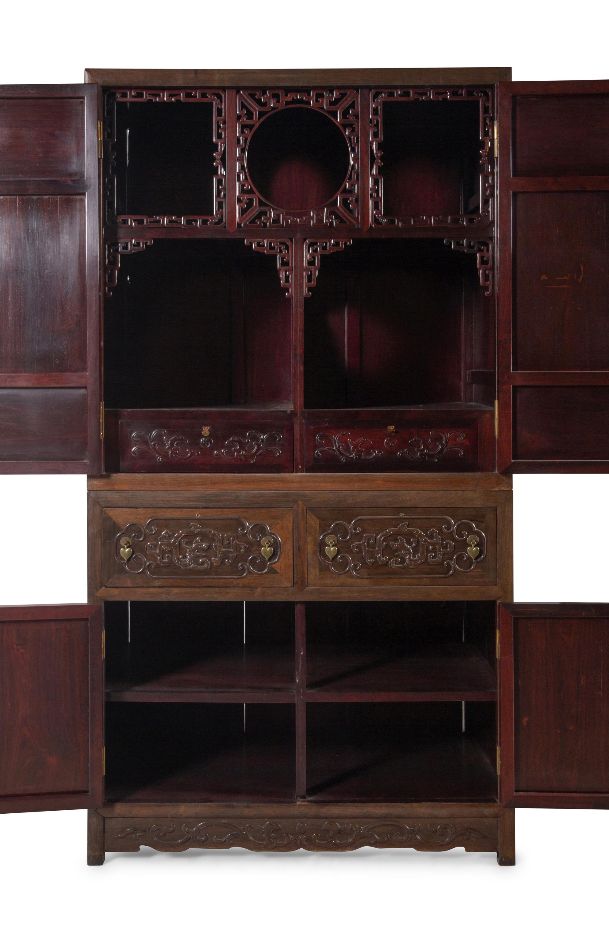 A Pair of Chinese Export Carved Hardwood Cabinets