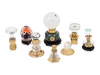 A Collection of Eight Glass Table Articles