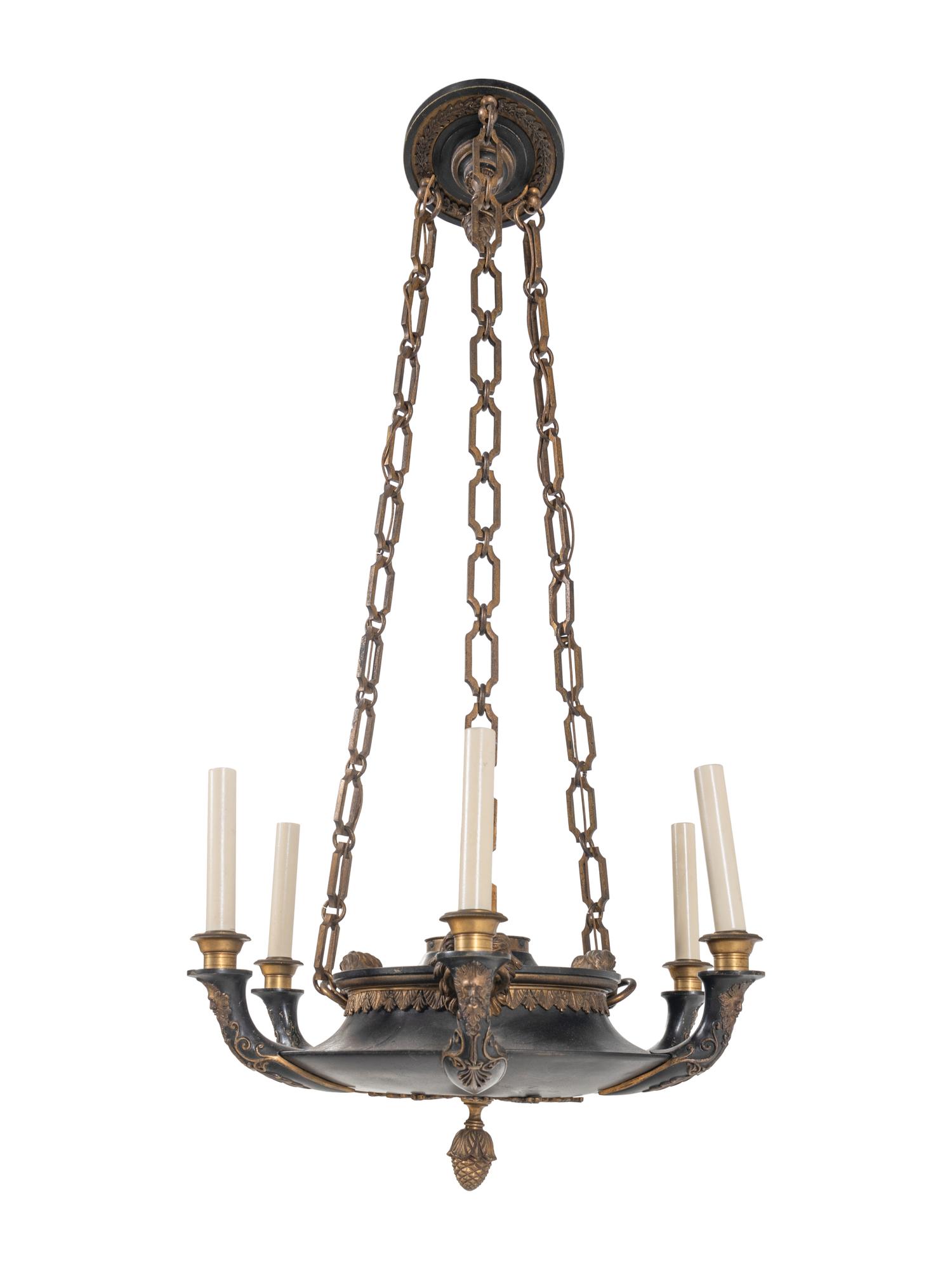An Empire Style Gilt Bronze and Tole Six-Light Chandelier