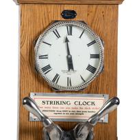 An Exhibit Supply Co. One Cent Striking Clock Game