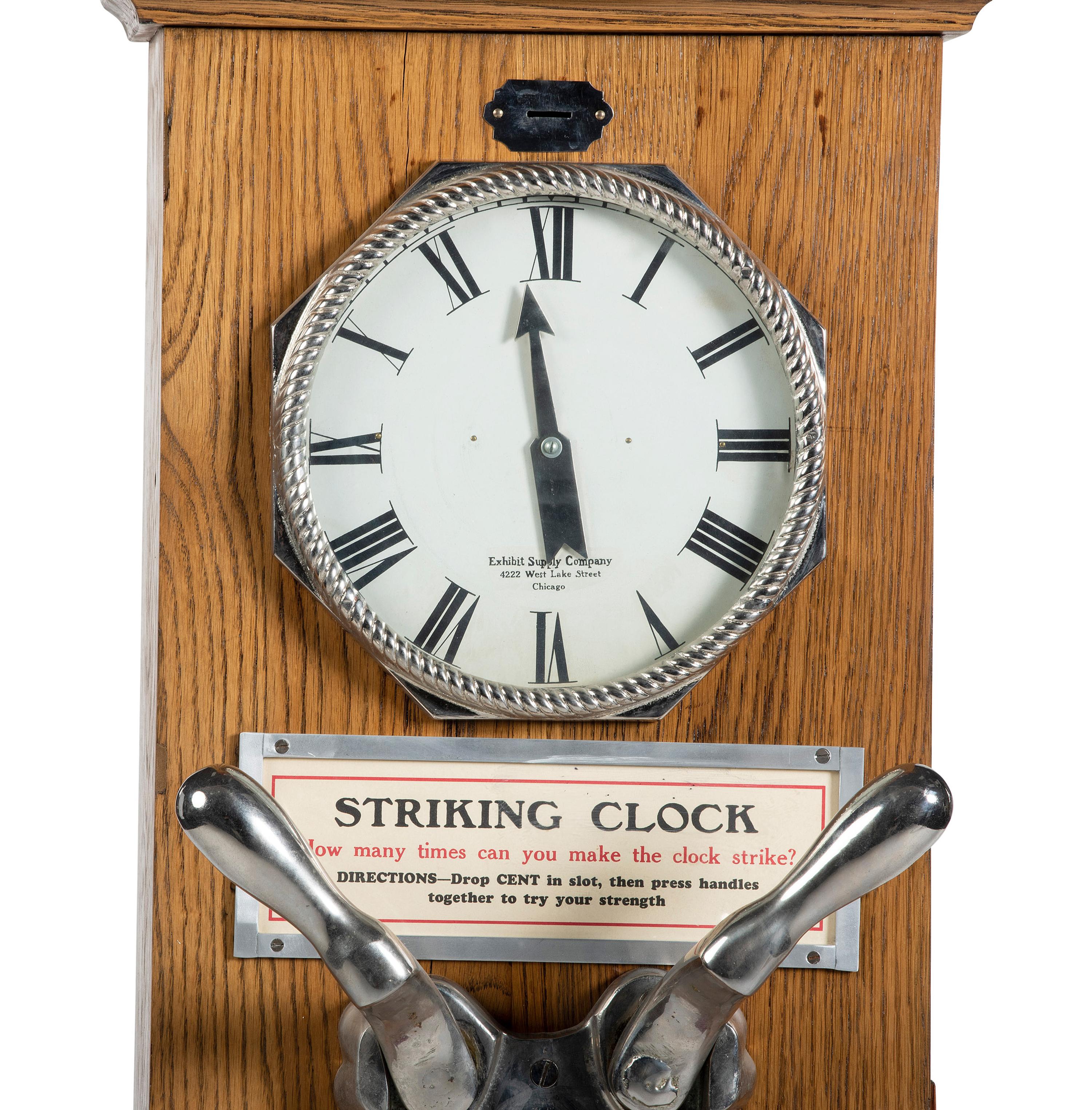 An Exhibit Supply Co. One Cent Striking Clock Game