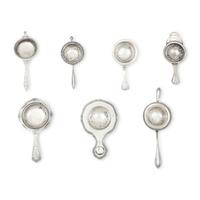 A Collection of Twenty Silver Tea Strainers