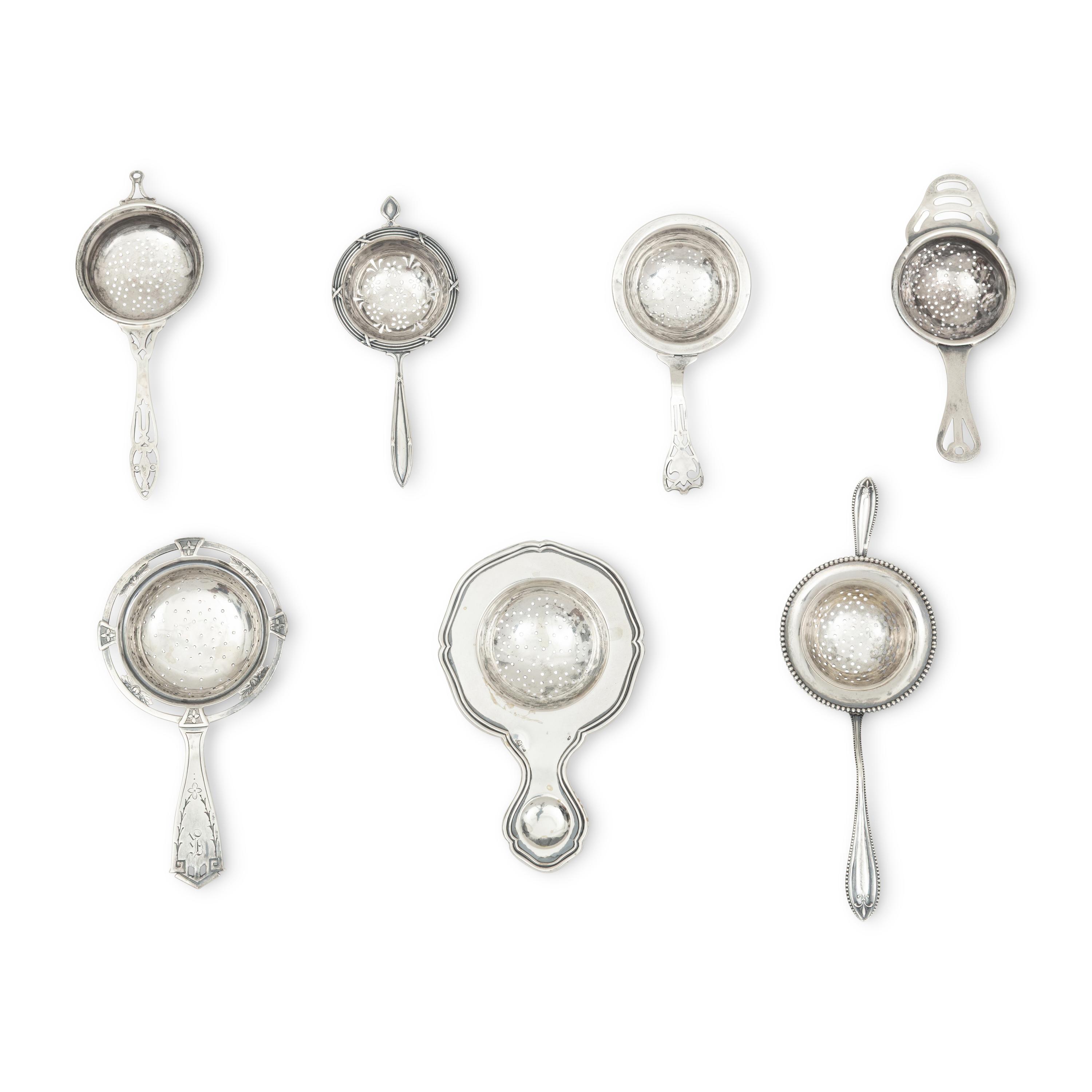 A Collection of Twenty Silver Tea Strainers
