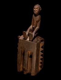 Two Dogon Wood Masks with Figures