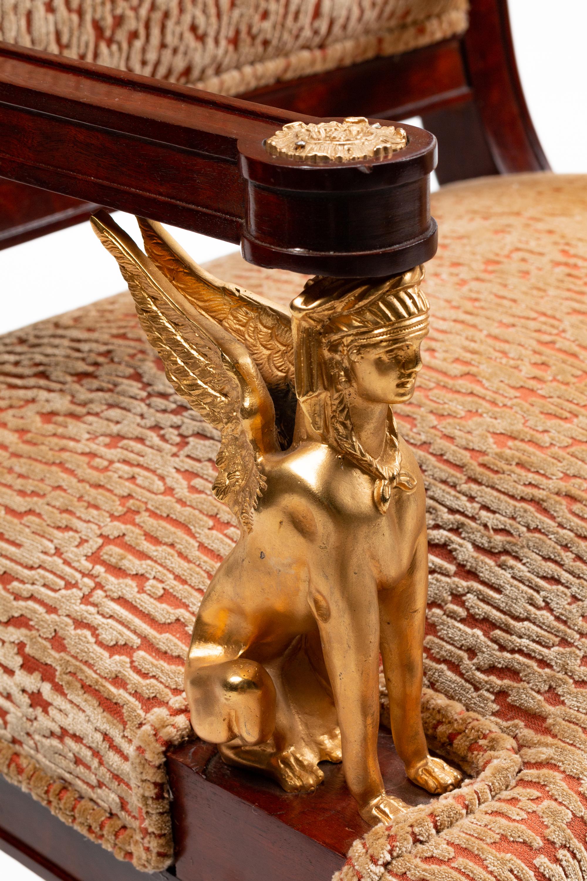 A Pair of Empire Style Gilt-Bronze-Mounted Mahogany Fauteuils