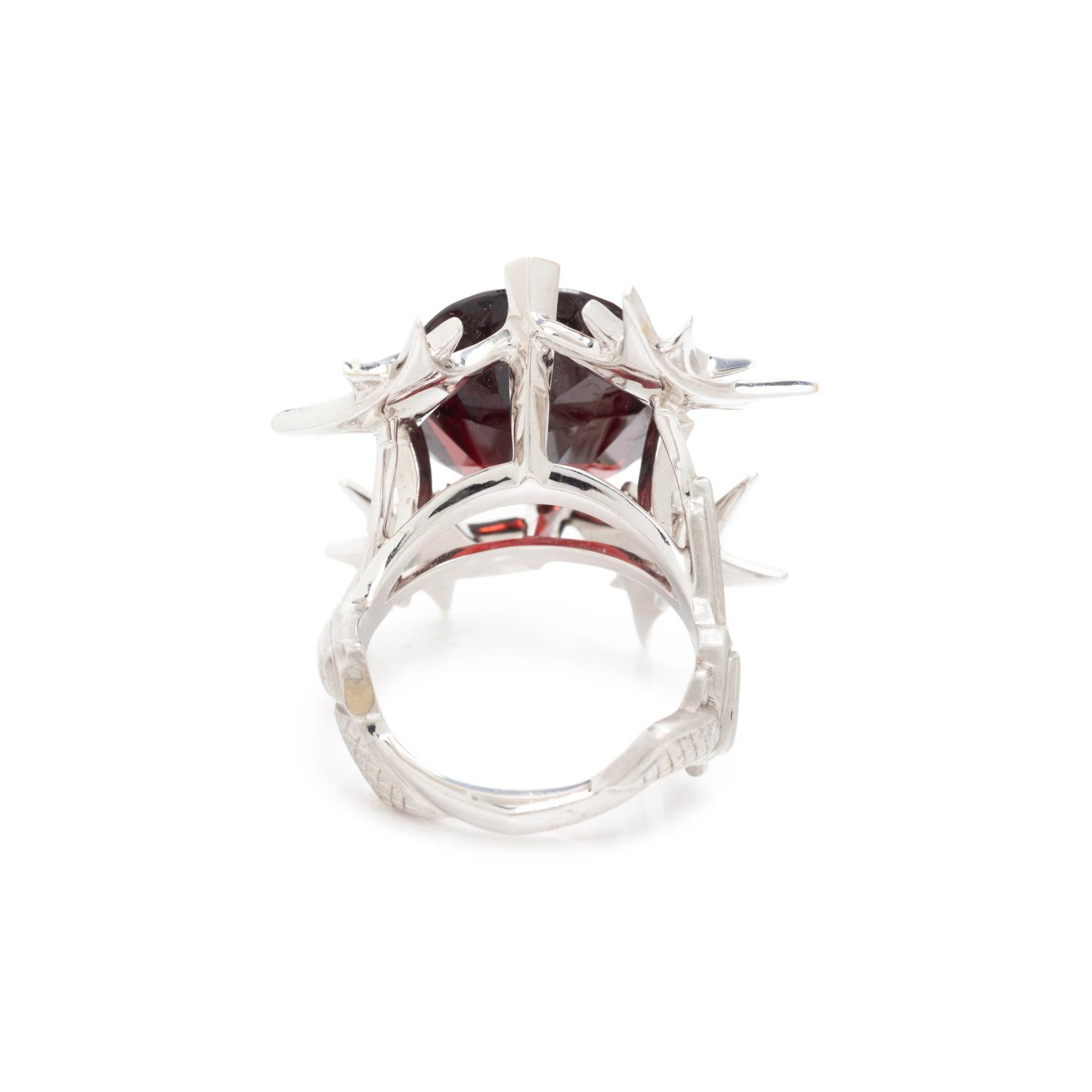 STEPHEN WEBSTER, GARNET, DIAMOND, AND BLACK DIAMOND 'PISTOL' RING