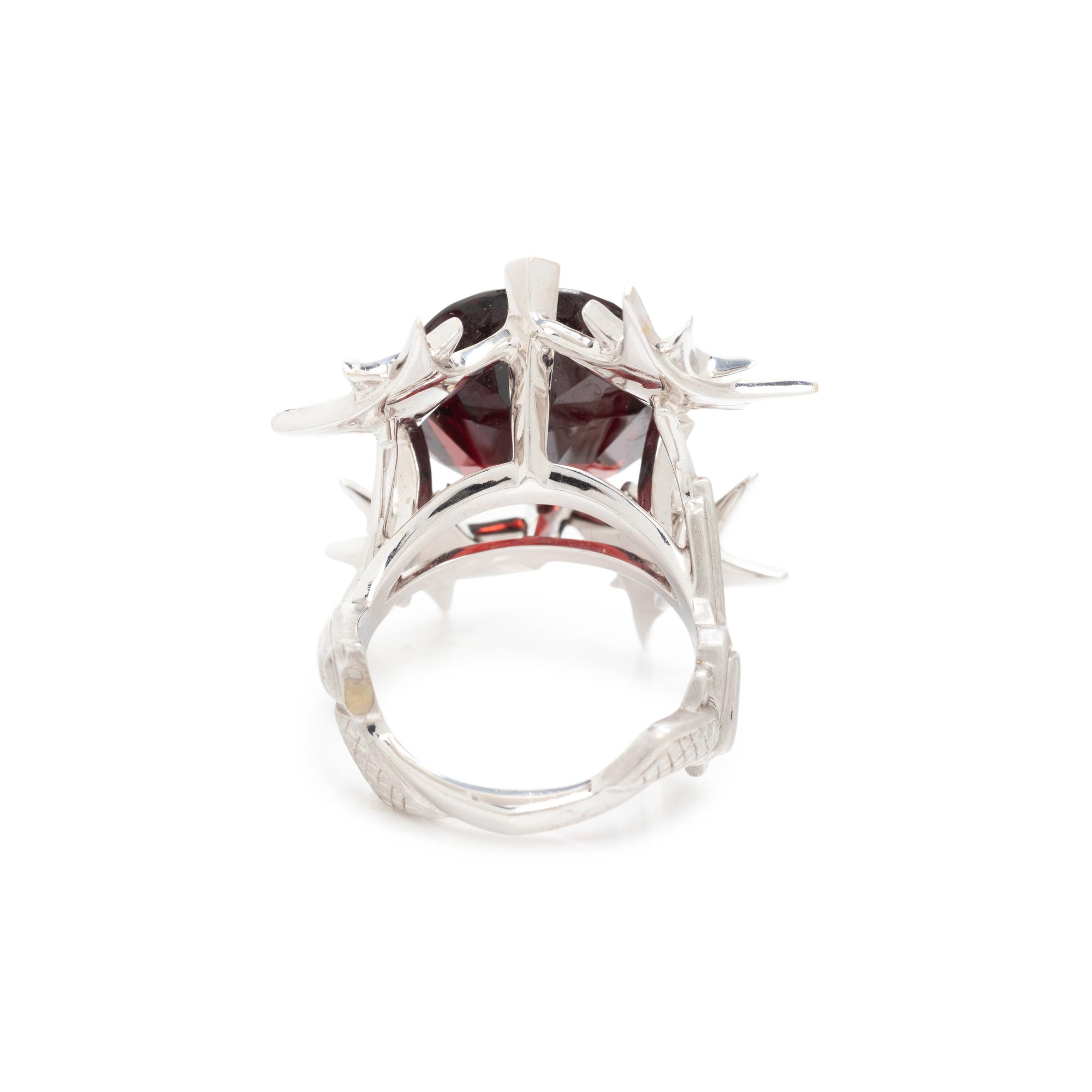 STEPHEN WEBSTER, GARNET, DIAMOND, AND BLACK DIAMOND 'PISTOL' RING