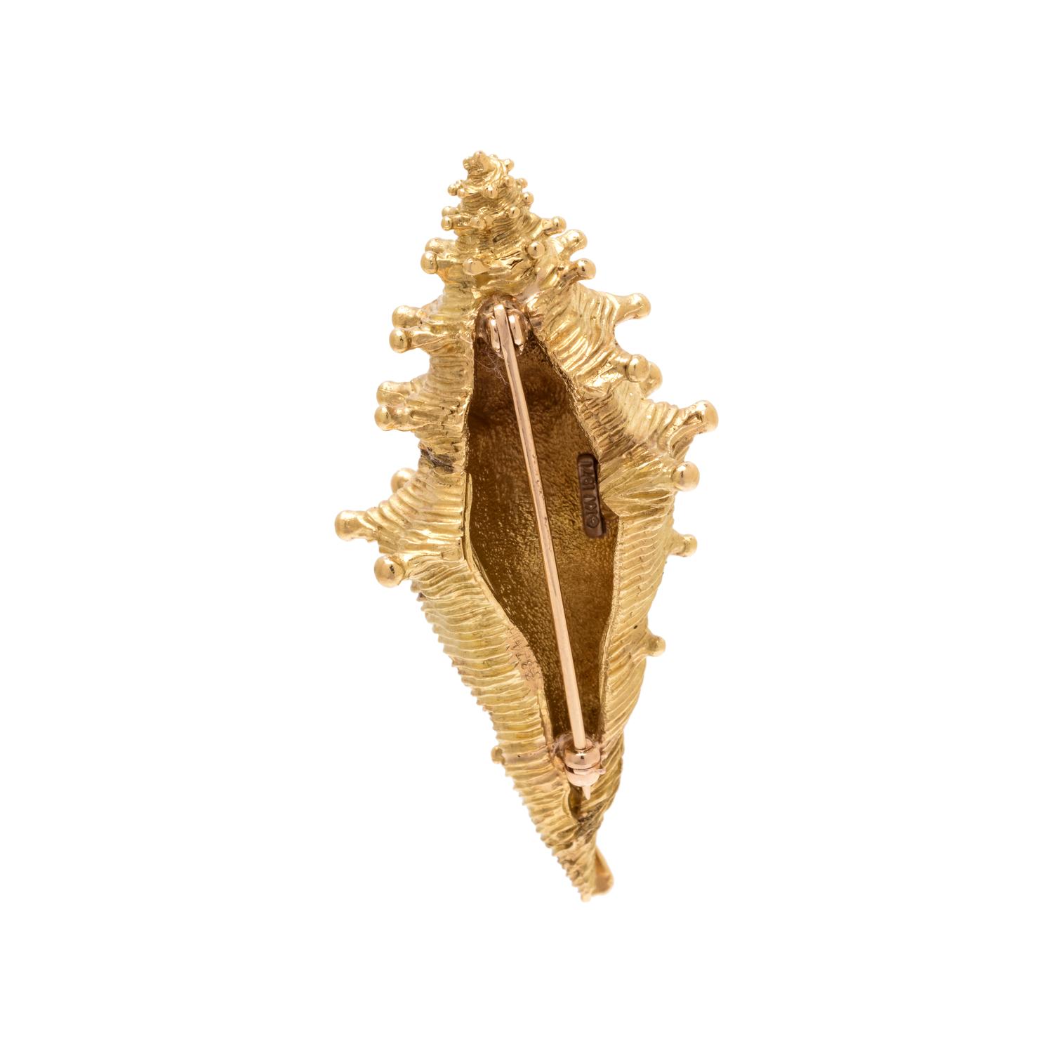 KURT WAYNE, YELLOW GOLD SHELL BROOCH