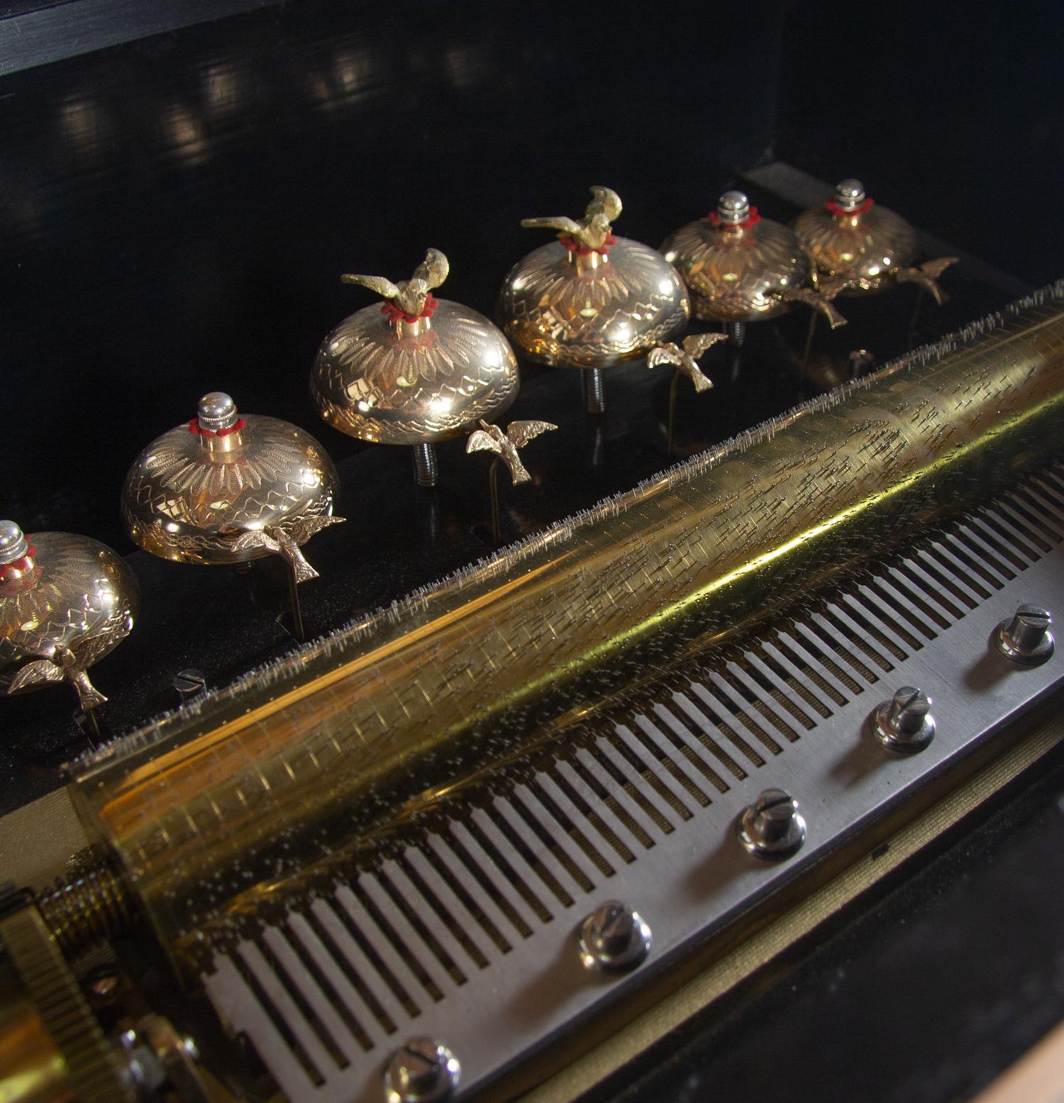 A Swiss Cylinder Bells-in-Sight Music Box on Stand