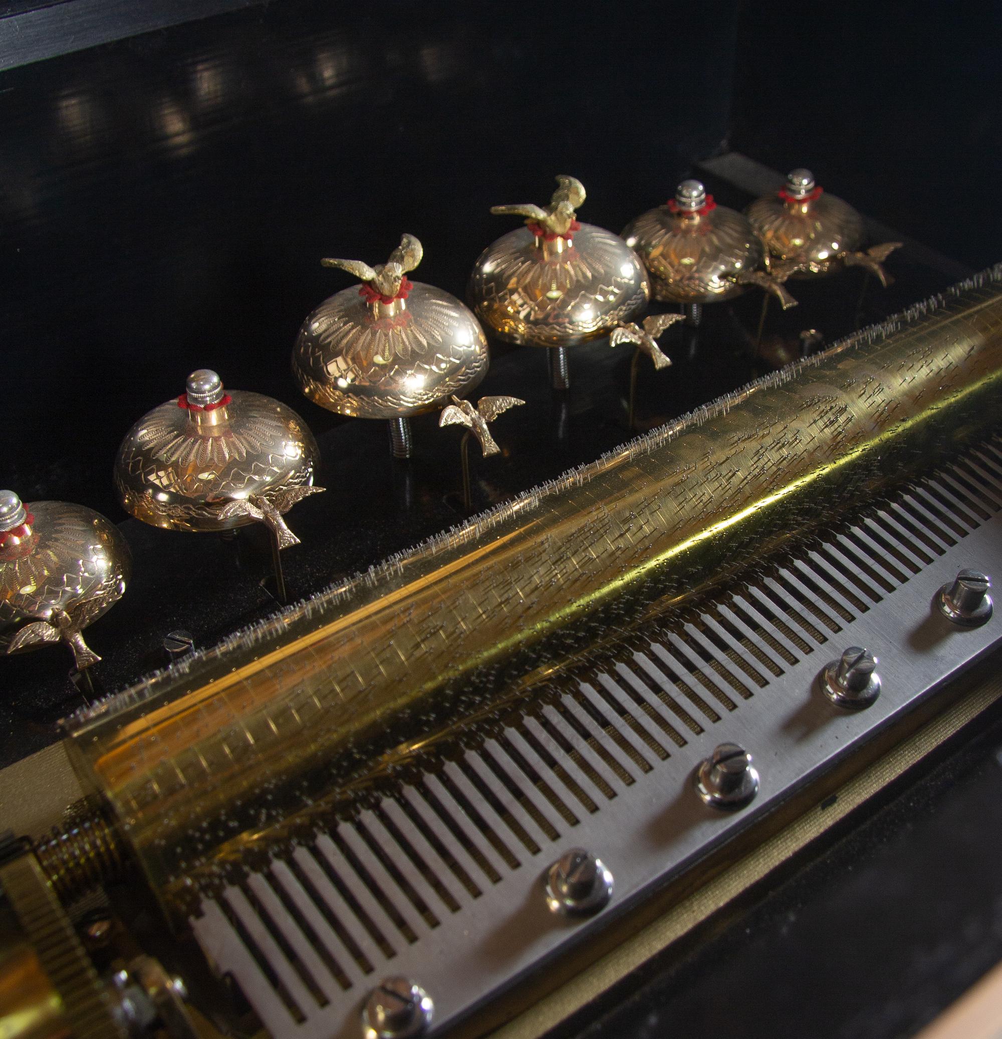 A Swiss Cylinder Bells-in-Sight Music Box on Stand
