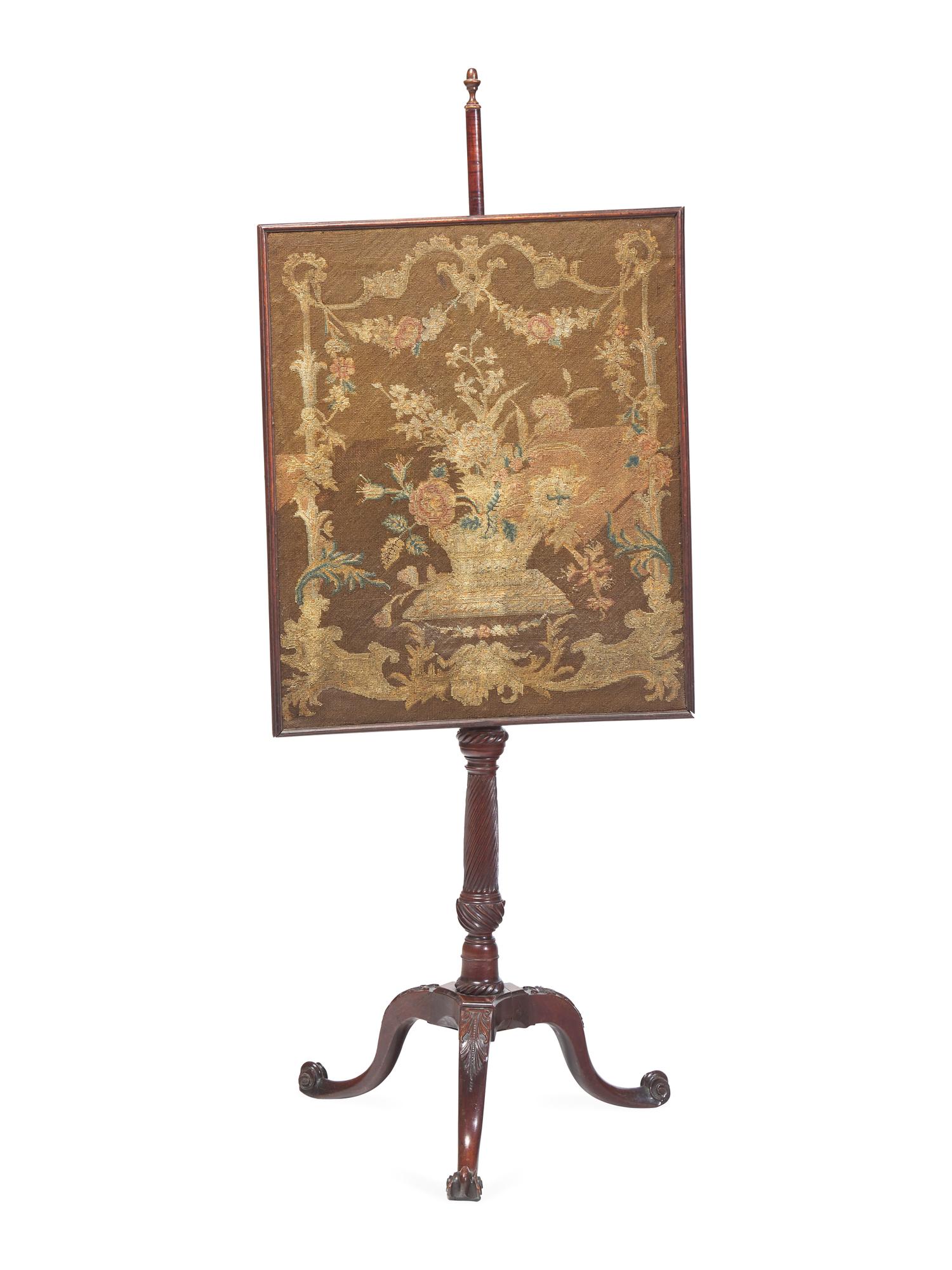 A George III Carved Mahogany Fire Screen With Petit Point Needlework Panel