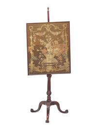 A George III Carved Mahogany Fire Screen With Petit Point Needlework Panel