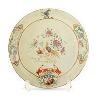 A Chinese Export Armorial Porcelain Plate with Restoration