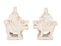 A Pair of Chinese Glazed Ceramic Figures of Guan Yin Atop a Foo Dog