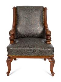 A Continental Carved Mahogany Armchair