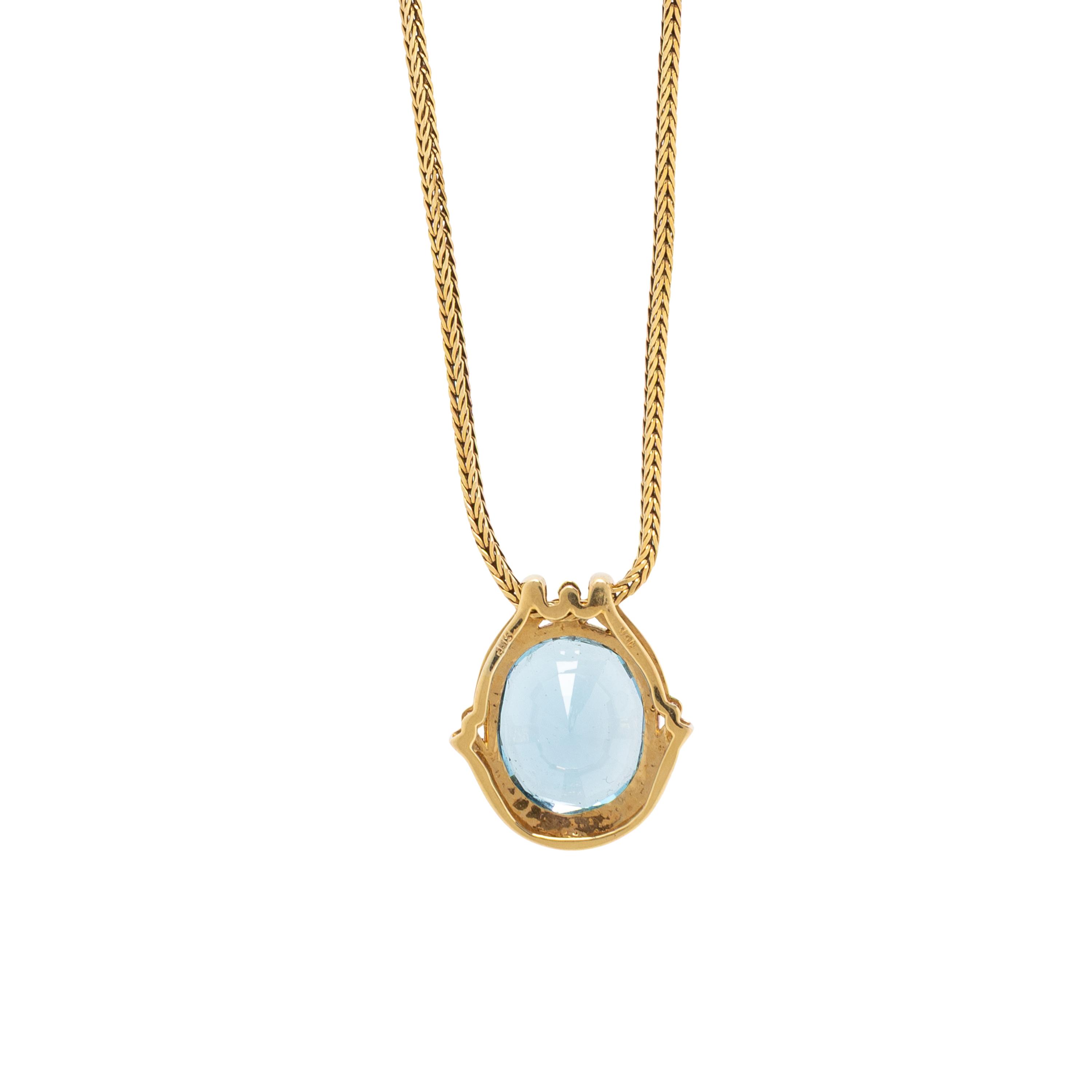 YELLOW GOLD, BLUE TOPAZ, AND DIAMOND PENDANT NECKLACE
