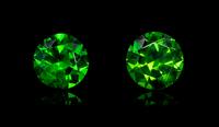 A Pair of Round Brilliant Cut Russian Demantoid Garnets Weighing 2.16 Carats Total,