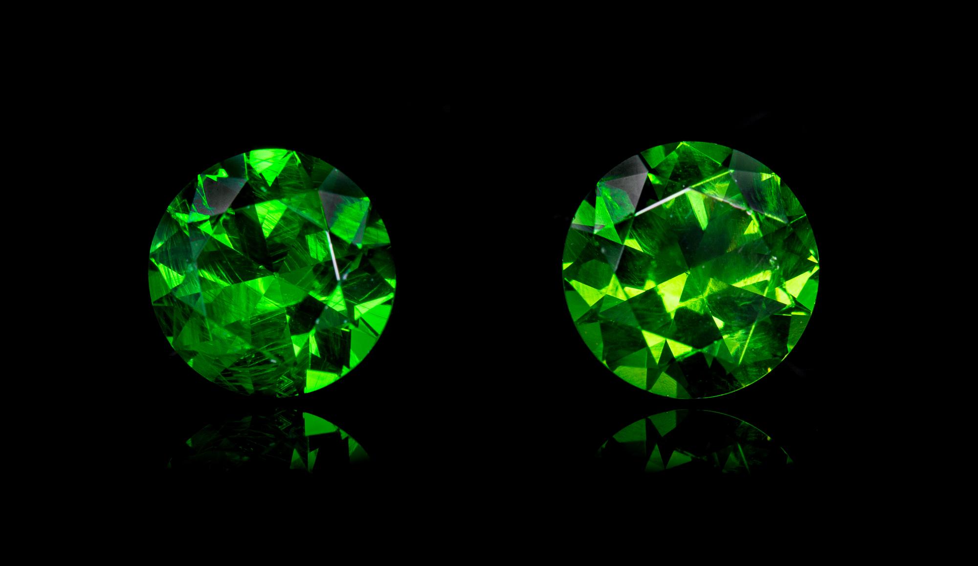 A Pair of Round Brilliant Cut Russian Demantoid Garnets Weighing 2.16 Carats Total,