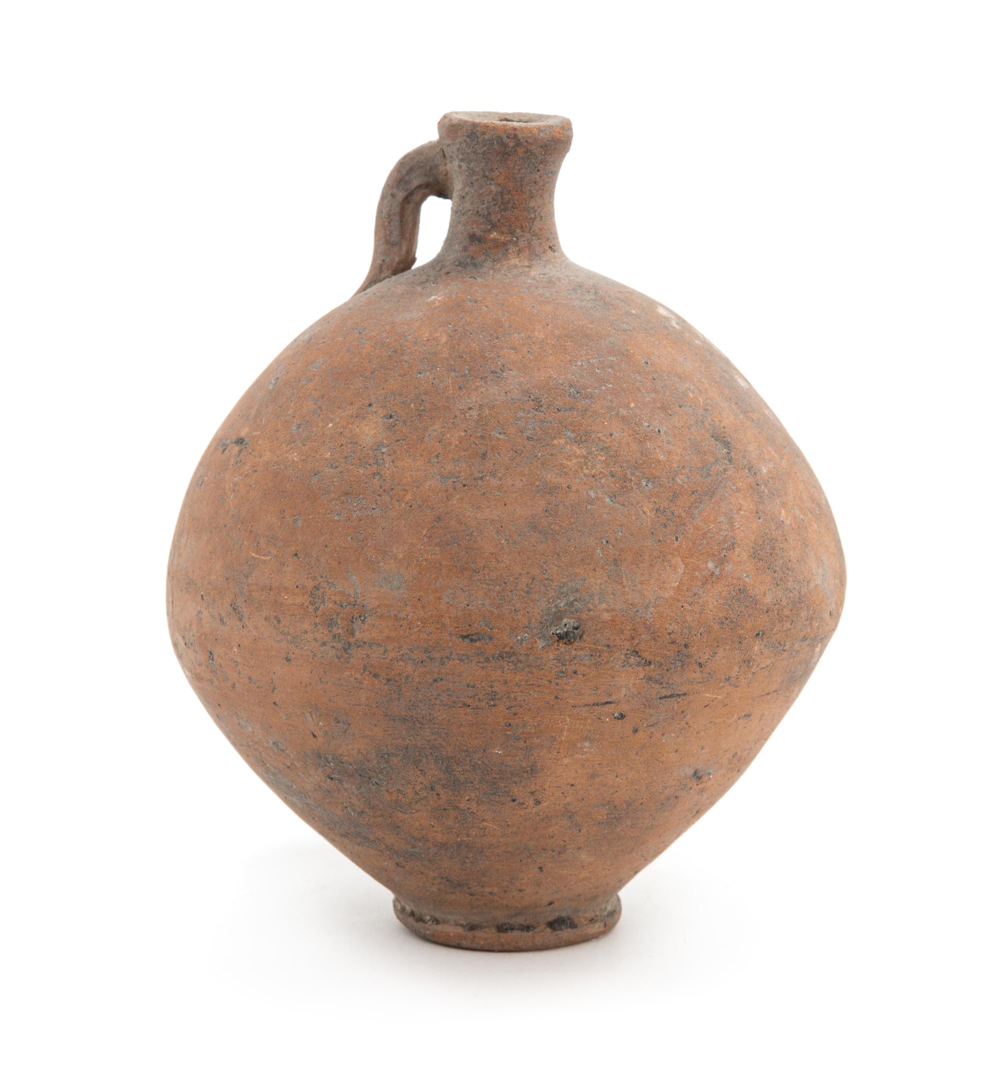 A Cypriot Globe Form Pottery Vessel. Height 4 1/2 x diameter 3 1/2 inches.