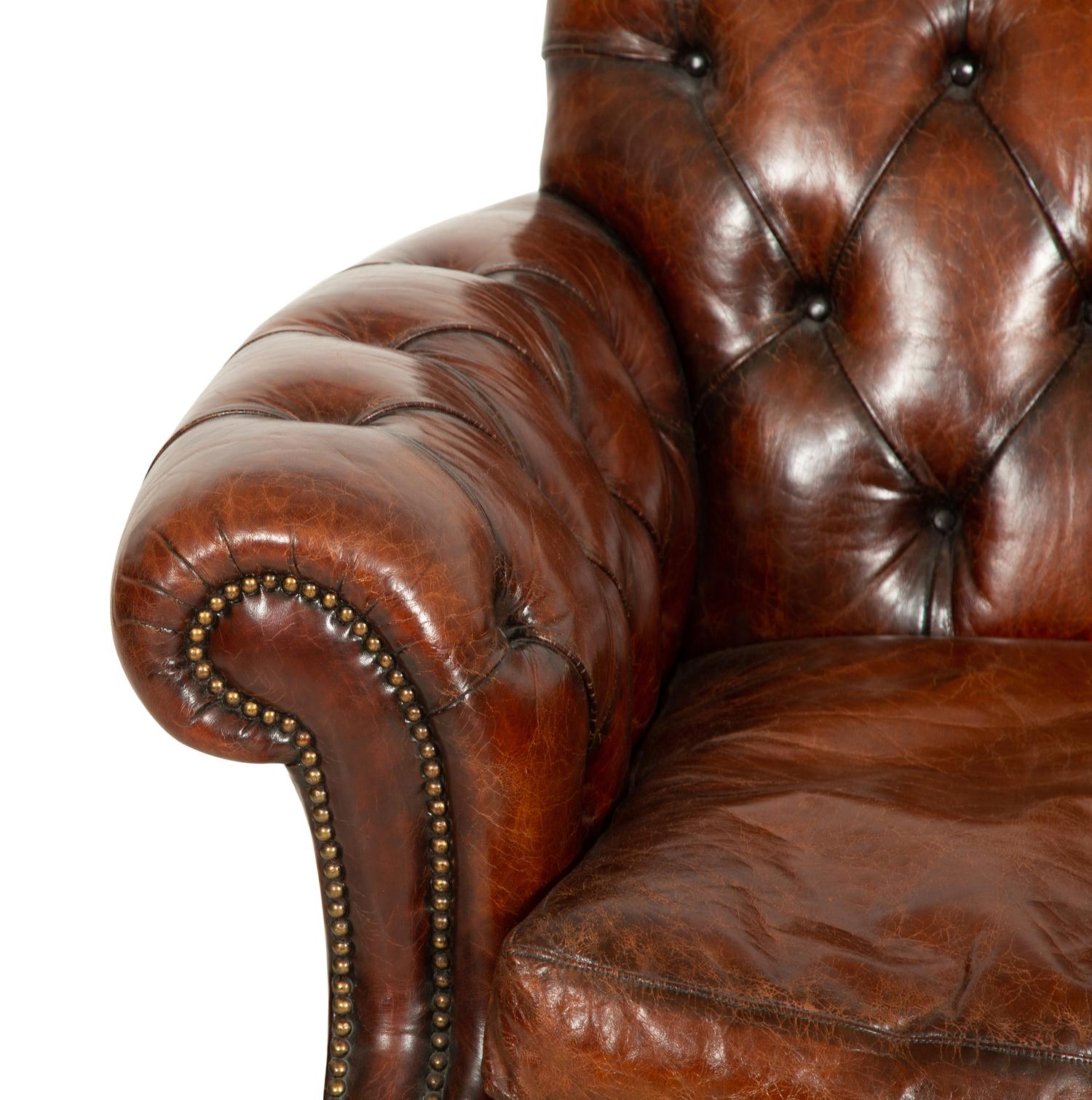 A Pair of Chesterfield Style Leather Club Chairs