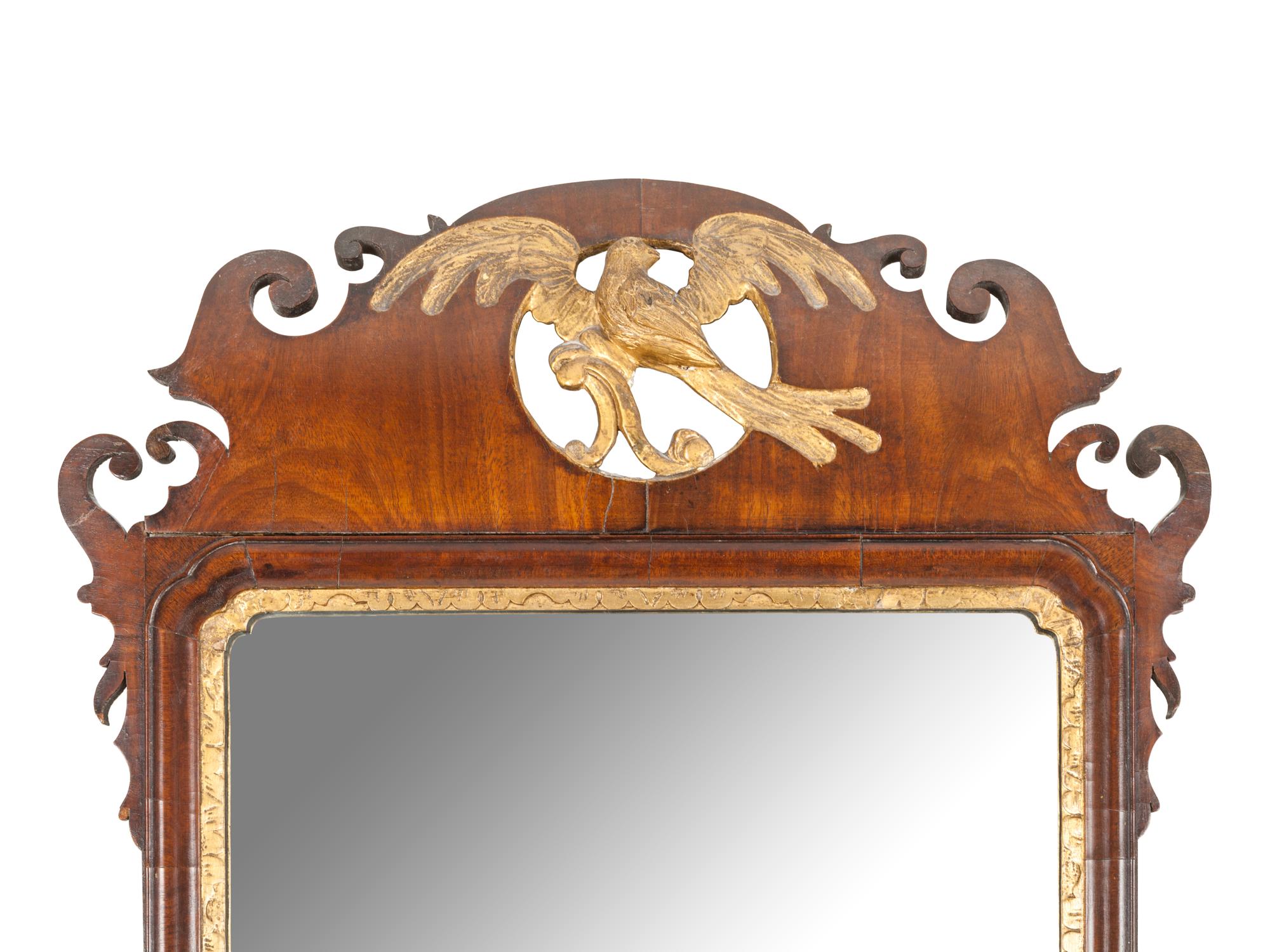 A George III Parcel Gilt Mahogany Mirror