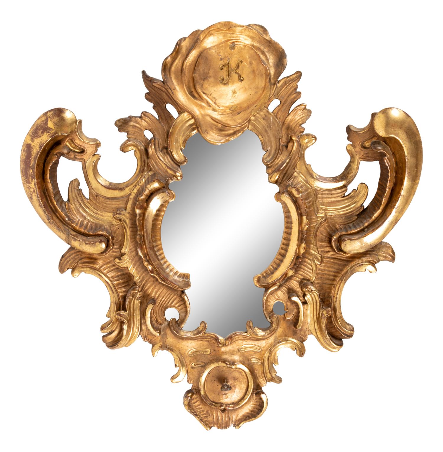 A Continental Carved Giltwood Mirror
