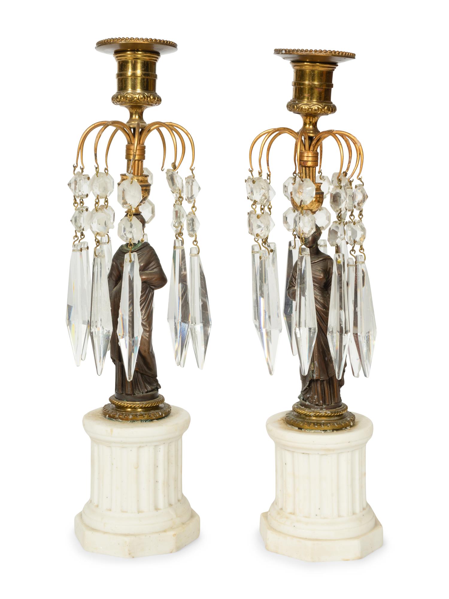 A Pair of French Patinated Bronze and Biscuit Porcelain Candlesticks