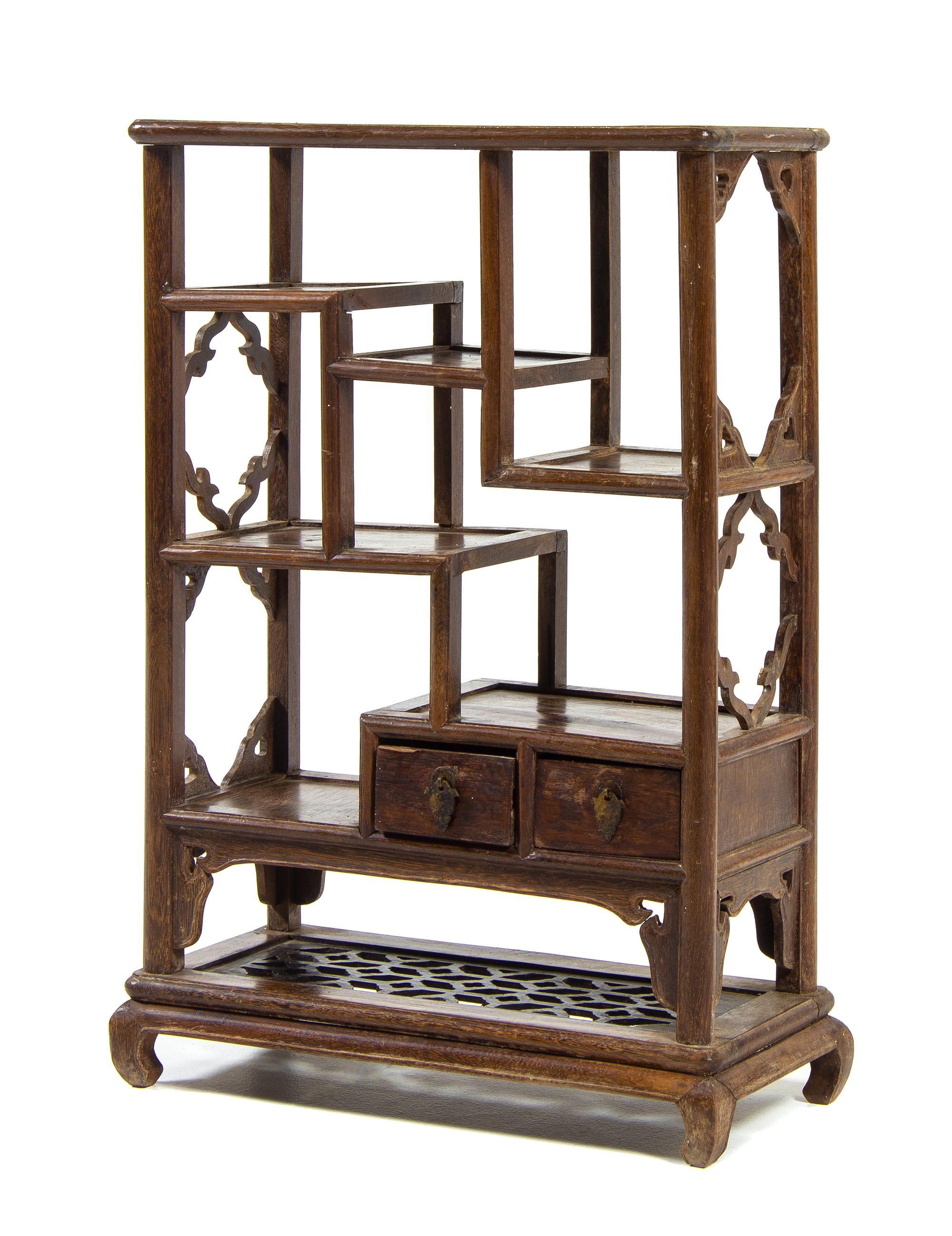 A Chinese Jichimu Wood Displaying Cabinet, Duobaoge Height 26 1/4 x width 17 1/4 x depth 7 3/4 inches. — LATE QING DYNASTY