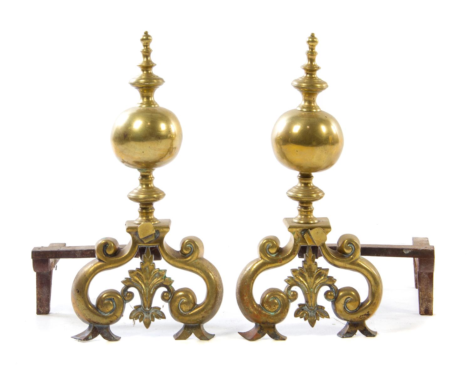 A Pair of Continental Brass Andirons Height 25 inches. — 18TH CENTURY