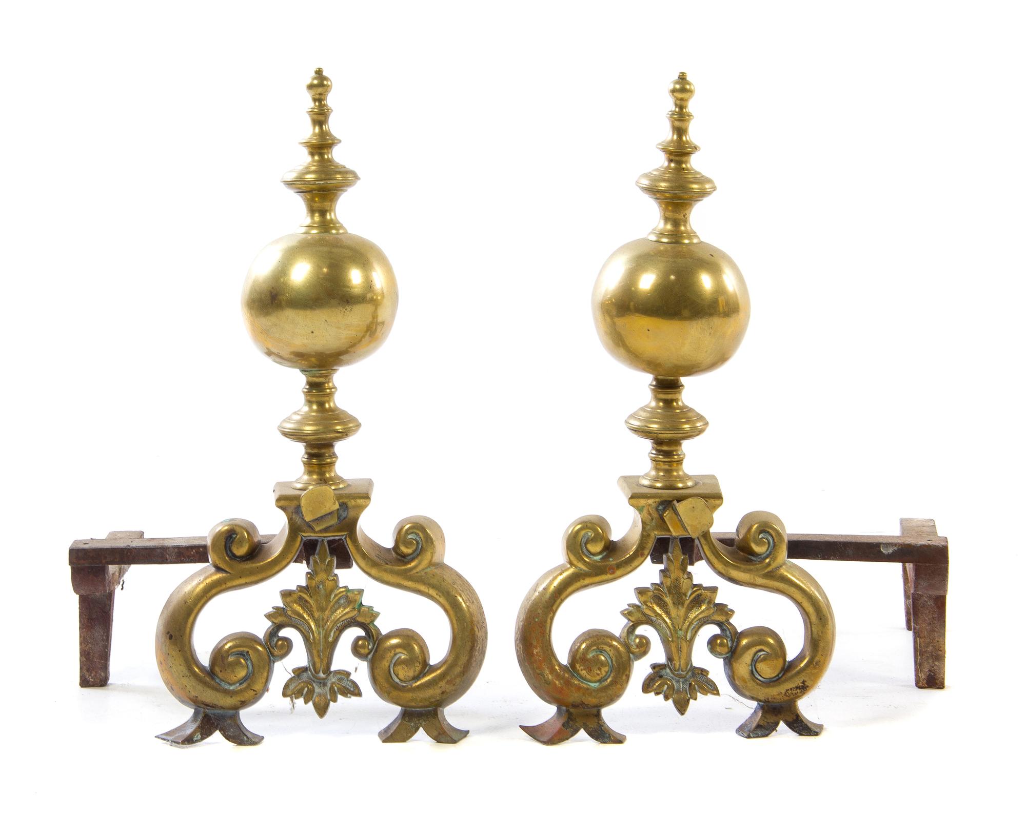 A Pair of Continental Brass Andirons Height 25 inches. — 18TH CENTURY