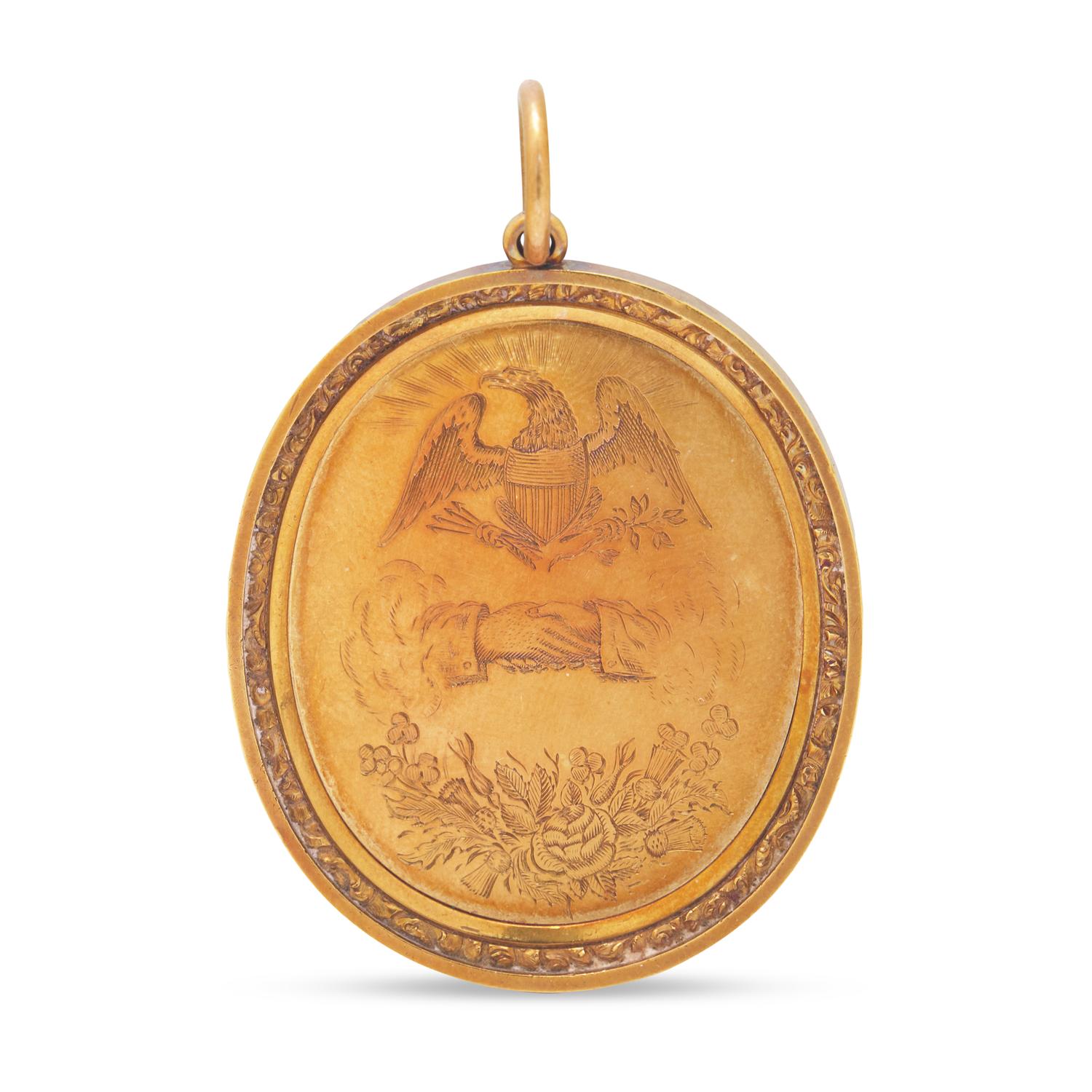 An Engraved Gold Presentation Pendant