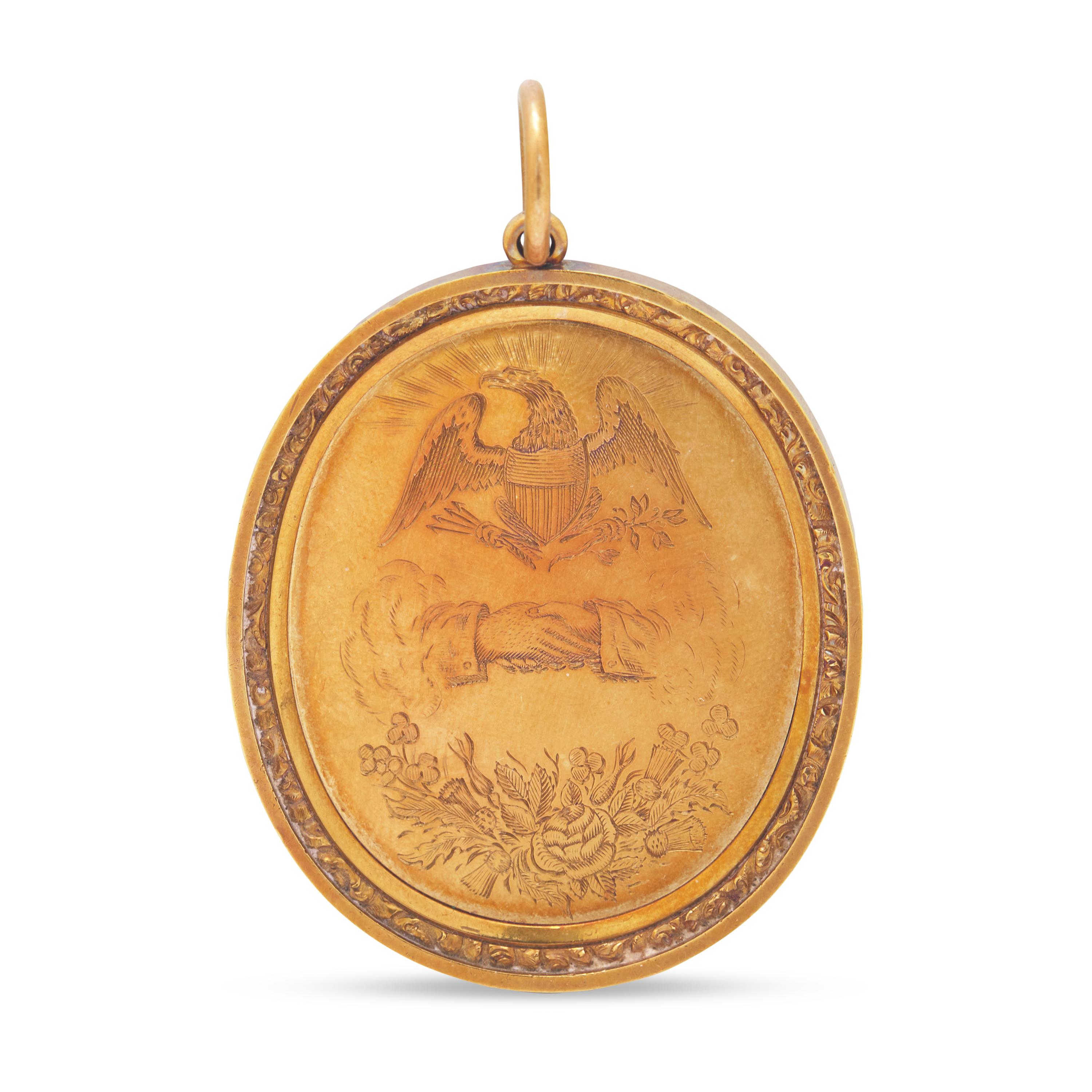 An Engraved Gold Presentation Pendant