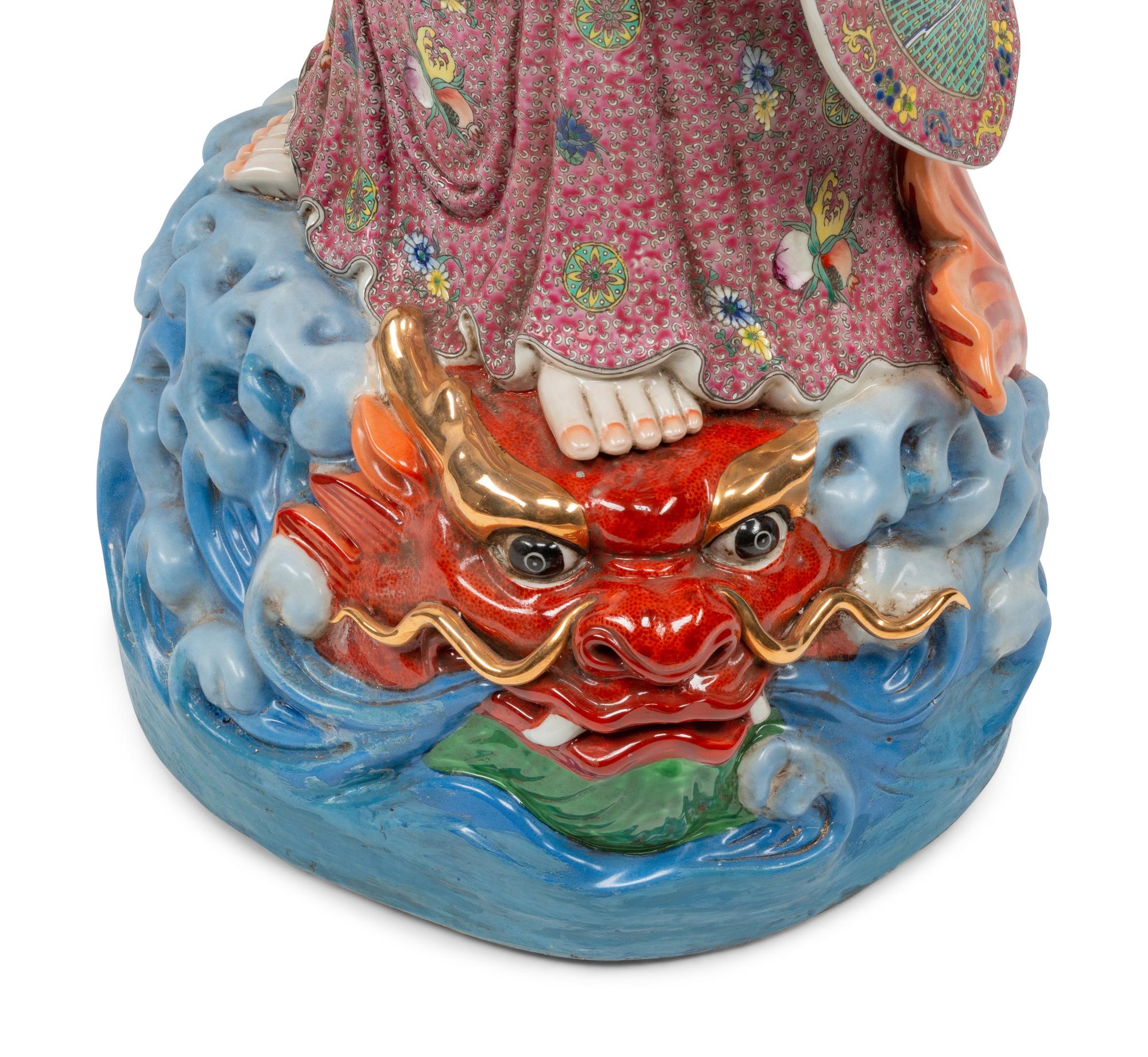 A Chinese Export Enameled Porcelain Figure of Guanyin